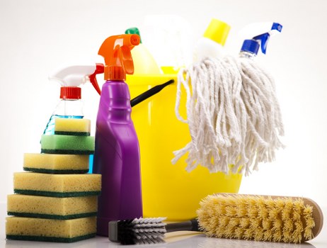 Professional carpet cleaning team following safe working practices